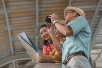 A family taking photos on a tour